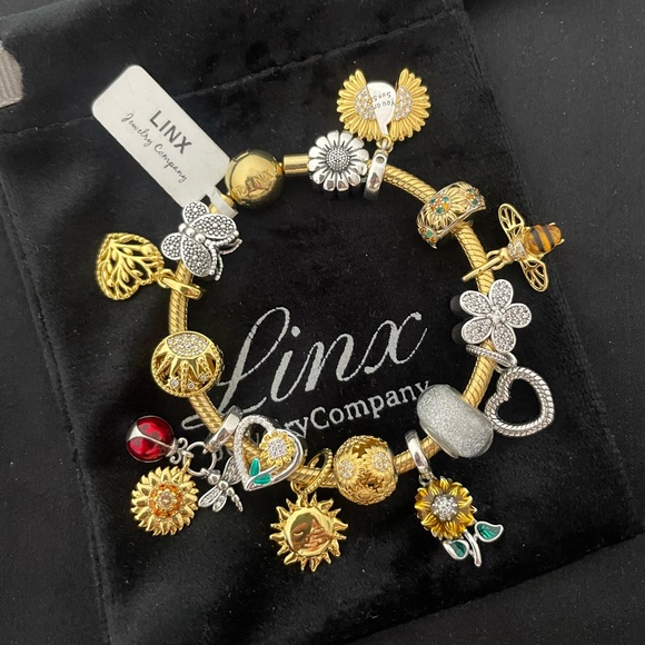 Linx Yellow Gold Bracelet with Gold and Silver Sunflower Themed Charms